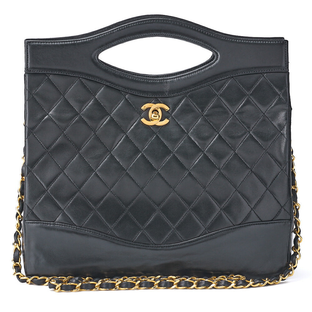 Sac fourre-tout matelassé d'occasion, bandoulière chaîne, cuir d'agneau noir, matériel doré.