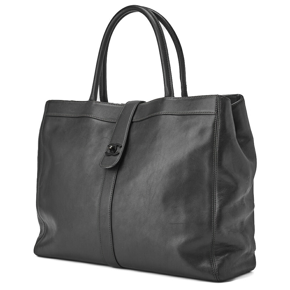 Sac fourre-tout à bandoulière d'occasion en cuir d'agneau noir bicolore avec accessoires argentés.