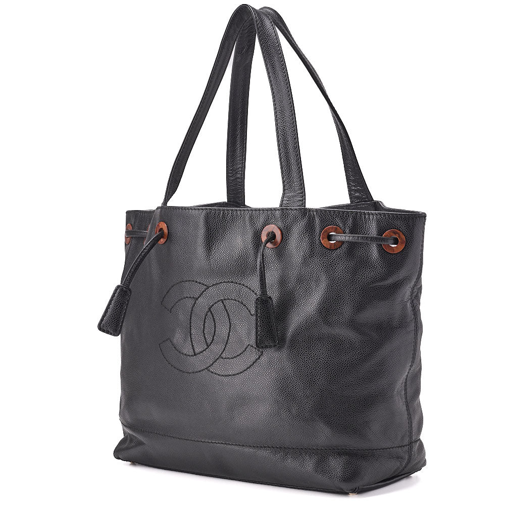 Sac à bandoulière d'occasion Coco Mark, cordon de serrage, cuir caviar, motif bois, quincaillerie dorée.