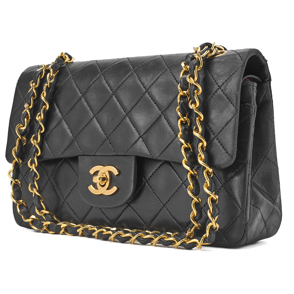 Sac bandoulière chaîne matelassé à double rabat en cuir d'agneau noir et métal doré d'occasion