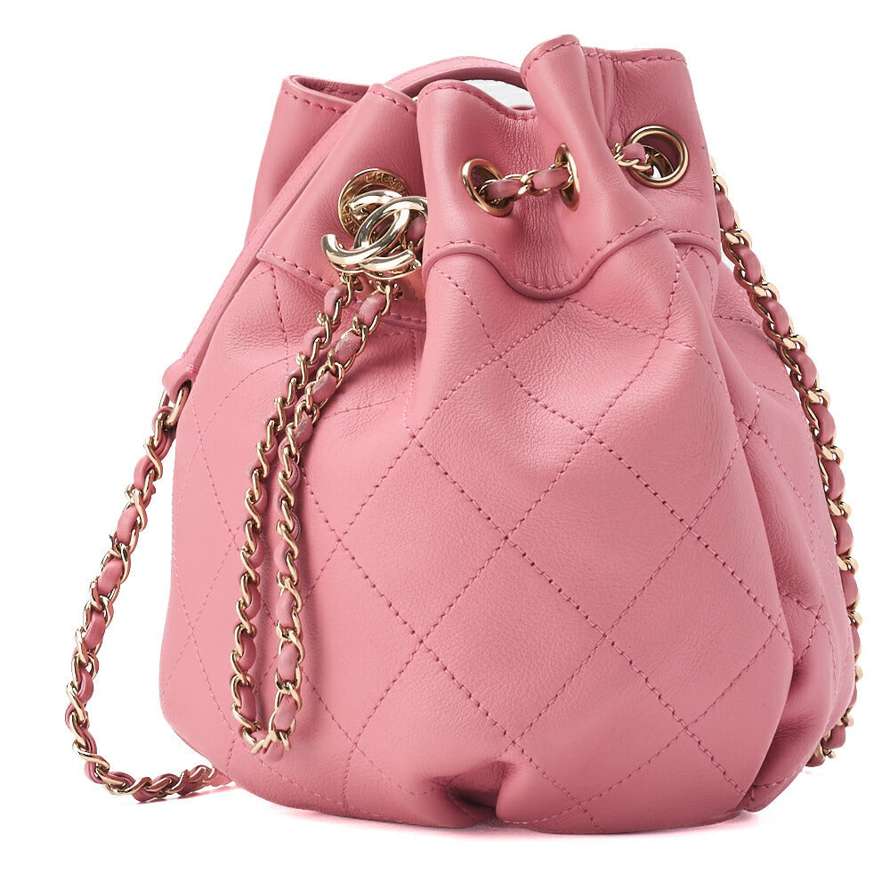 Sac bandoulière matelassé d'occasion, avec cordon de serrage, cuir d'agneau, rose, finitions dorées.