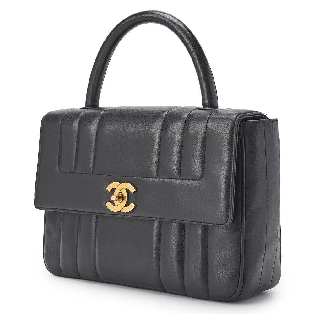 Sac bandoulière Mademoiselle d'occasion, fermoir tournant, cuir d'agneau, noir, finitions dorées.