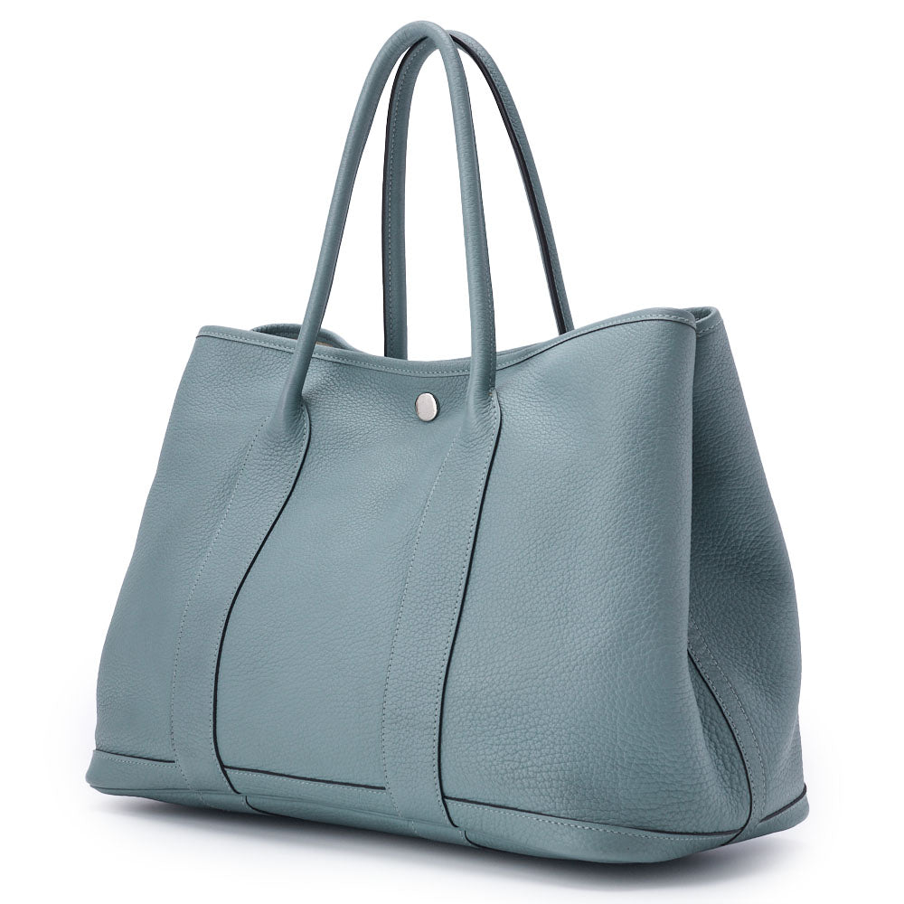 Sac fourre-tout Garden Party PM d'occasion en cuir Negonda Blue Sun Seal avec accessoires argentés.