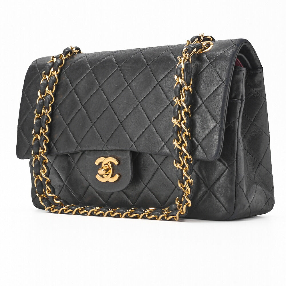 Sac bandoulière d'occasion, double rabat matelassé, cuir d'agneau, noir, finitions dorées.