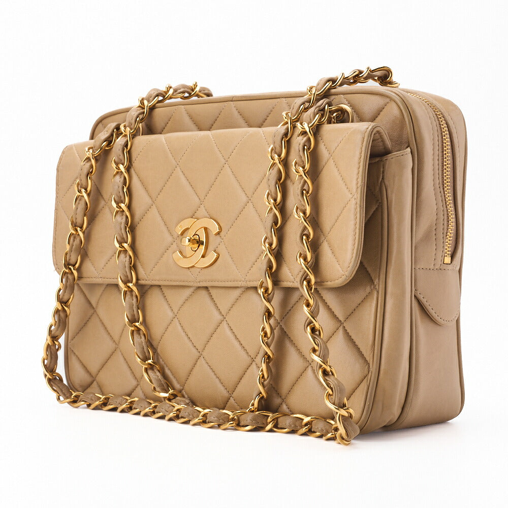 Sac bandoulière d'occasion, matelassé, fermoir tournant, cuir d'agneau, beige, finitions dorées.