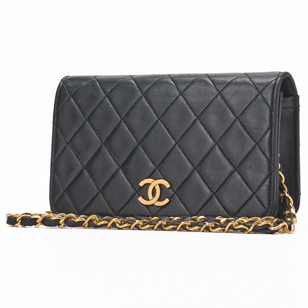 Sac bandoulière d'occasion en cuir d'agneau matelassé noir et métal doré.
