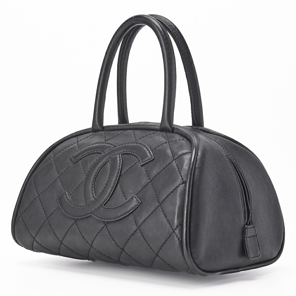 Sac Mini Boston d'occasion en cuir de veau matelassé noir et métal argenté.