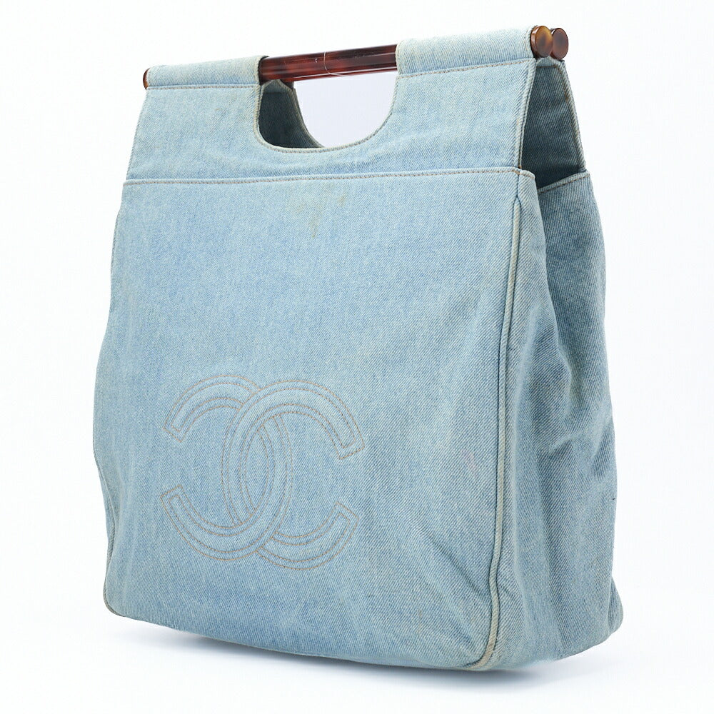 Sac à main d'occasion Coco Mark en denim à motif écaille de tortue et accessoires dorés.