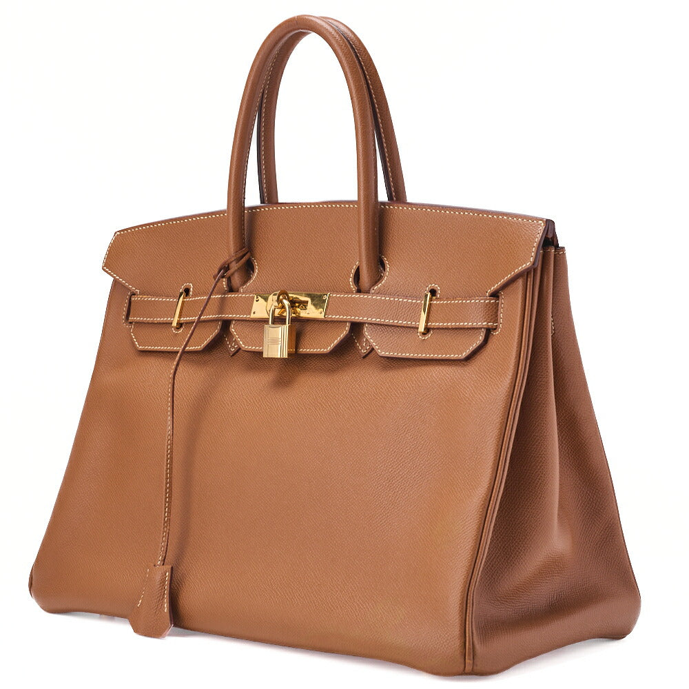 Sac à main Birkin 35 d'occasion Kushbel Gold avec accessoires dorés.
