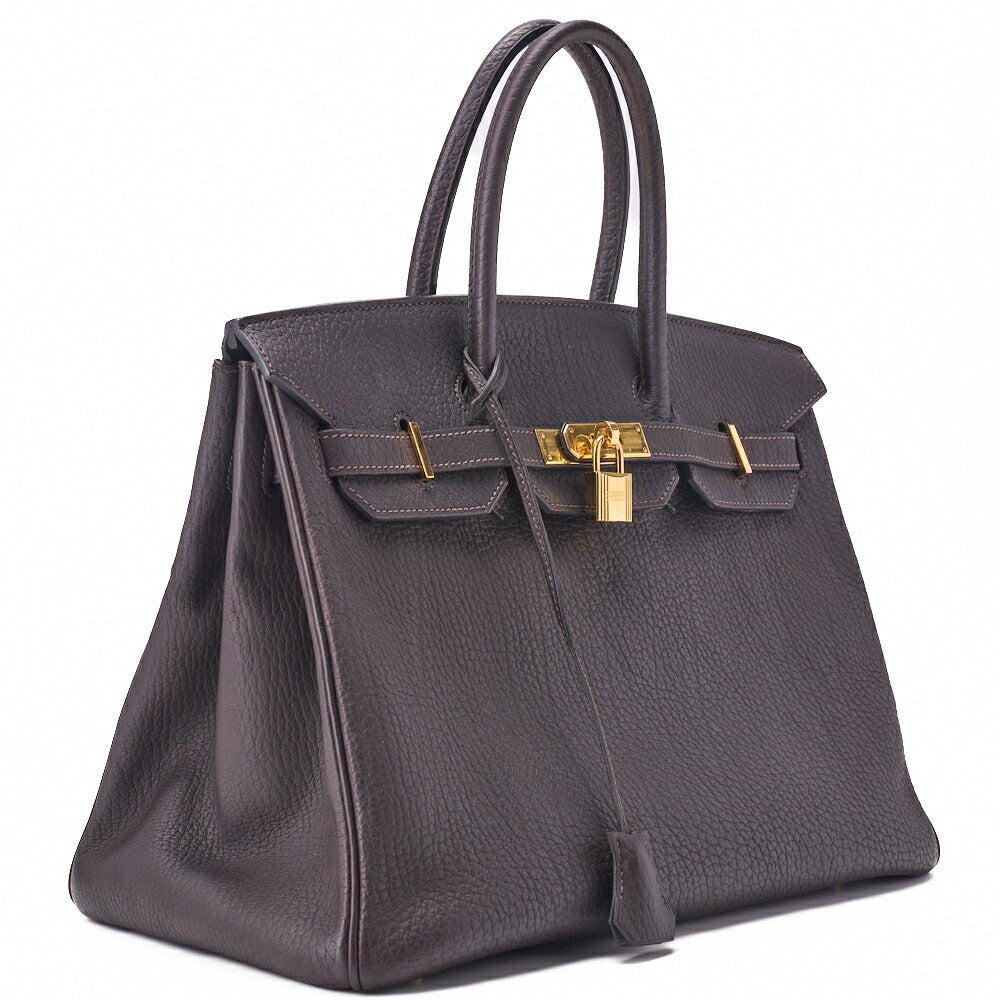 Sac à main Birkin 35 d'occasion, sac à bandoulière Tryon Clemence Raisin, quincaillerie dorée, d'occasion