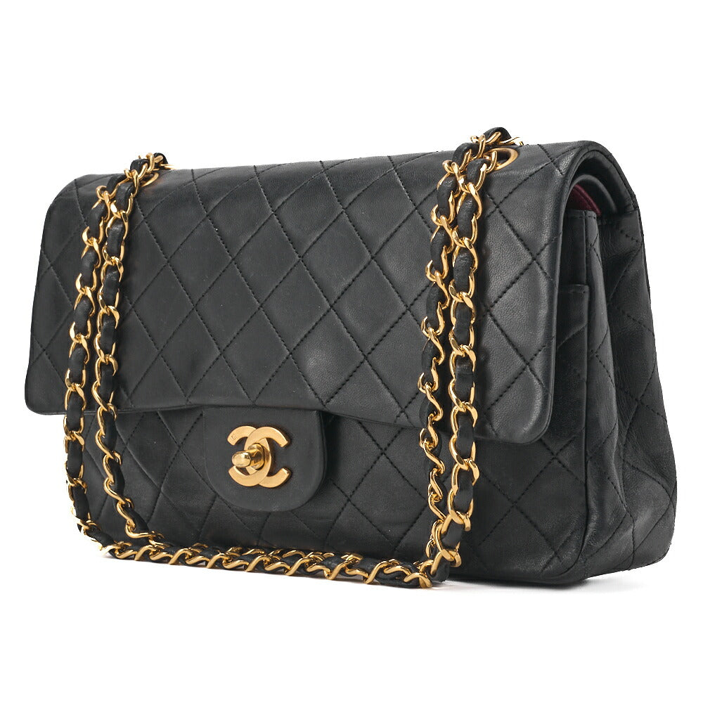 Sac bandoulière chaîne matelassé à double rabat en cuir d'agneau noir et métal doré d'occasion
