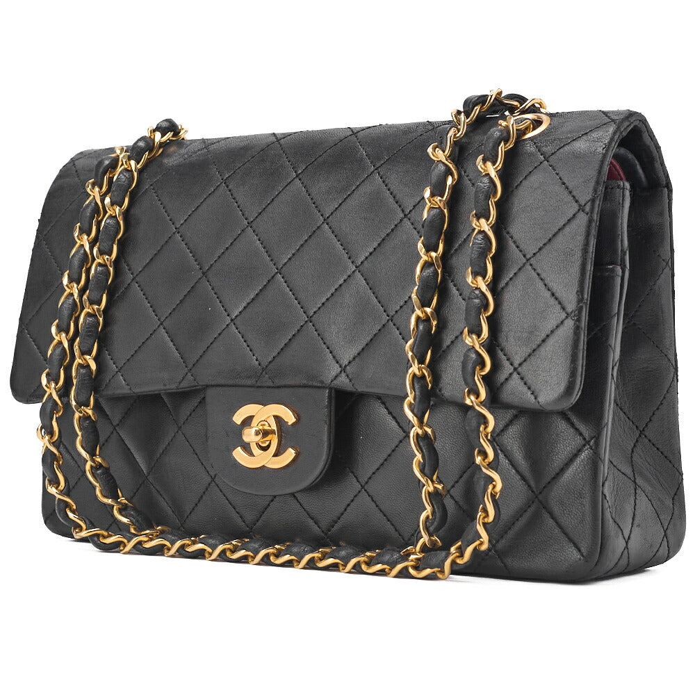 Sac bandoulière chaîne matelassé à double rabat en cuir d'agneau noir et métal doré d'occasion