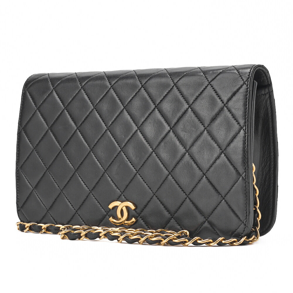 Sac à bandoulière chaîne matelassé d'occasion, fermoir à pression, cuir d'agneau noir, quincaillerie dorée.