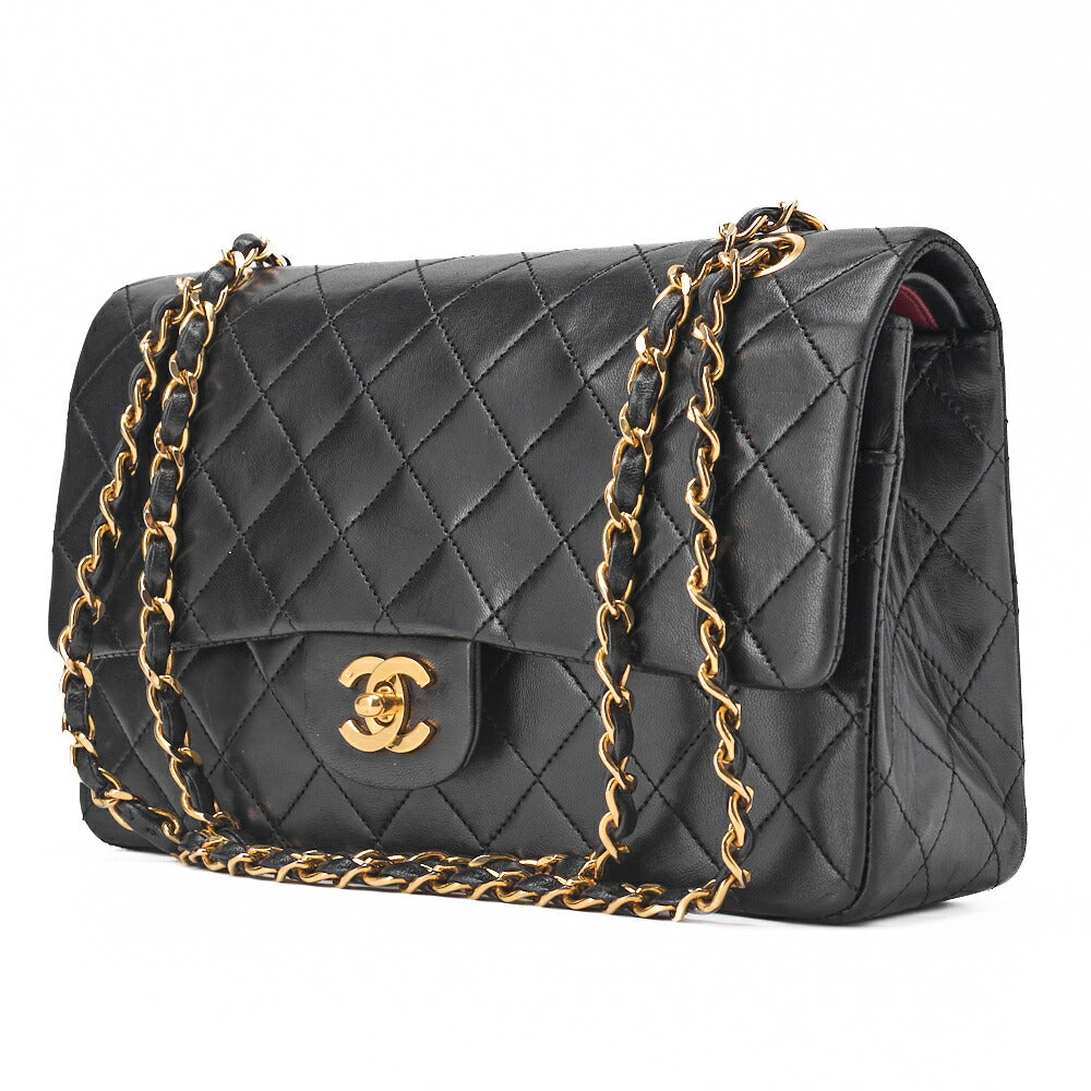Sac bandoulière chaîne matelassé à double rabat en cuir d'agneau noir et métal doré d'occasion