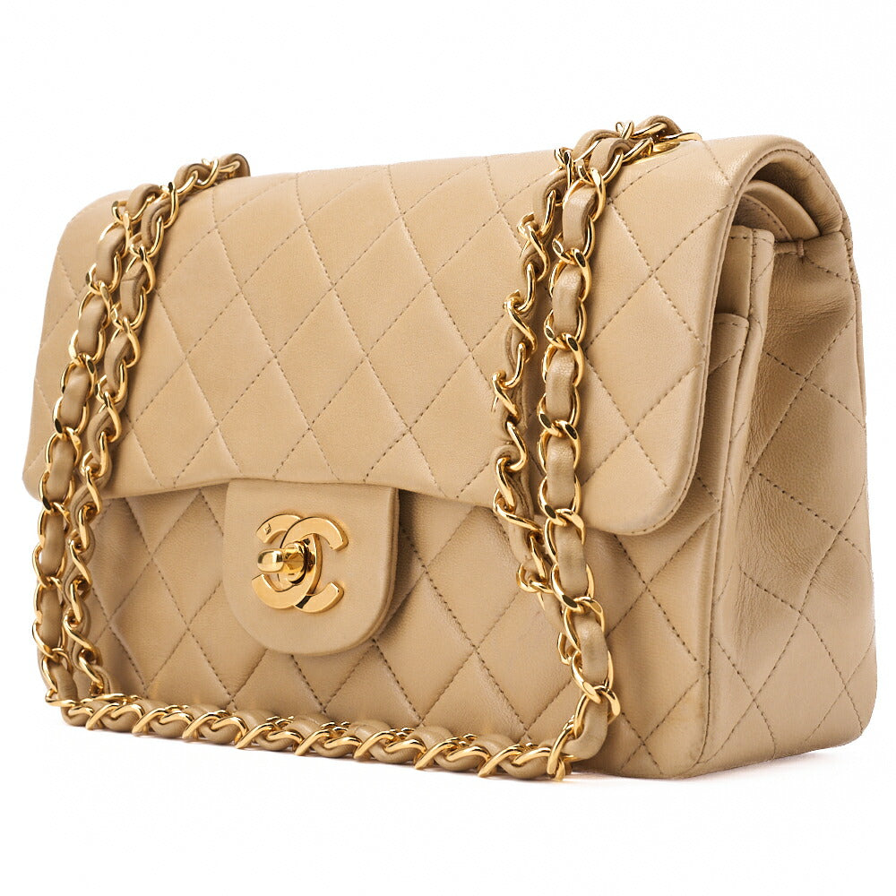 Sac bandoulière chaîne matelassé à double rabat en cuir d'agneau beige et accessoires dorés d'occasion