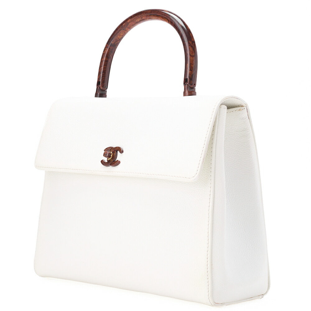 Sac à main d'occasion à fermoir tournant, forme Kelly, motif bois, cuir caviar, finitions dorées blanches, d'occasion